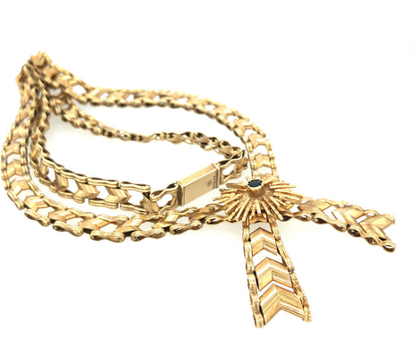 1970s 9k Gold Necklace with a Tied Ribbon Design Set with a Sapphire The Vintage Jewellery Company