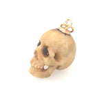 Victorian Carved Bone Skull Pendant with Garnet Eyes The Vintage Jewellery Company